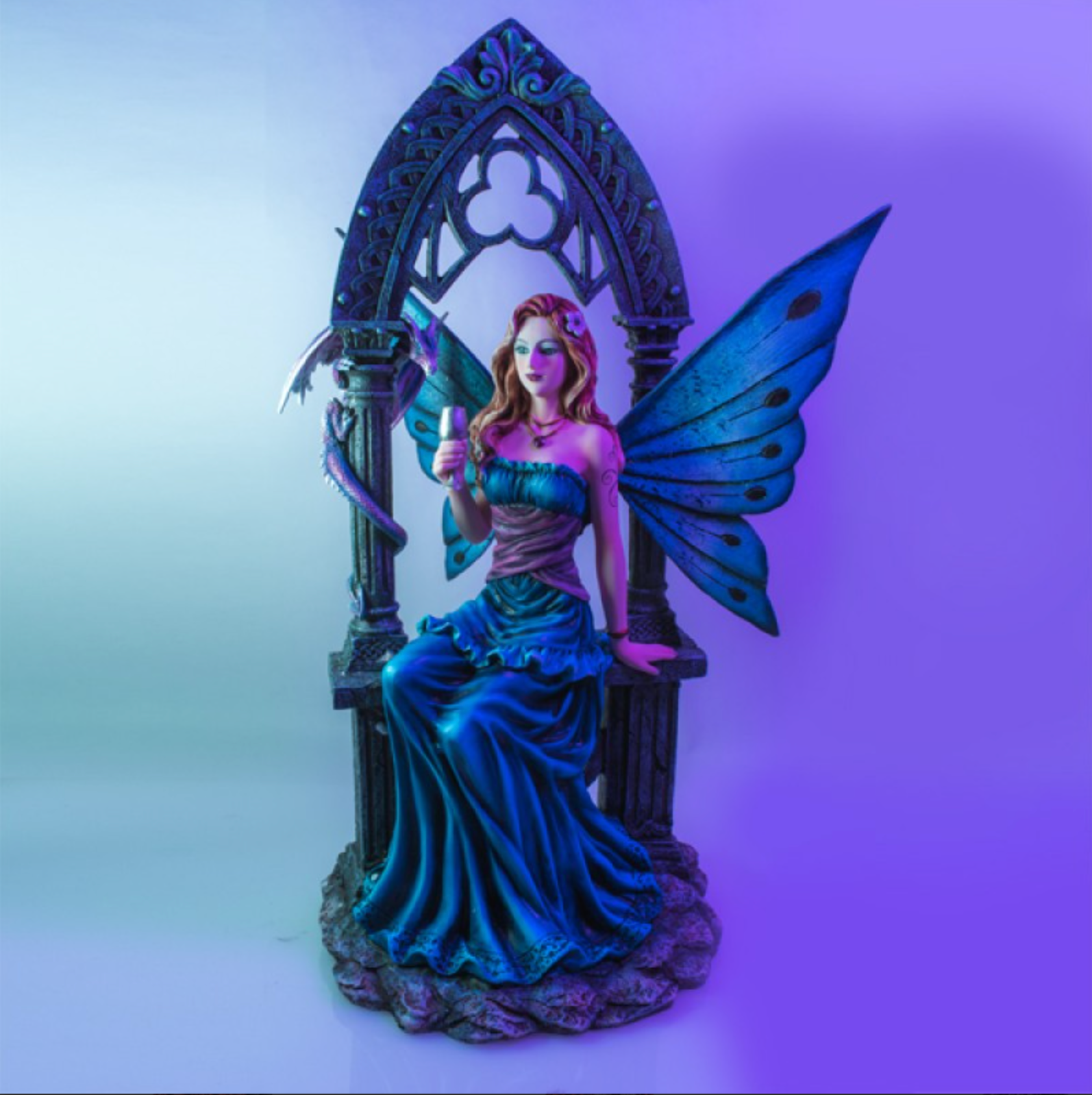 Fairy in Blue Dress under Stone Arch Figurine